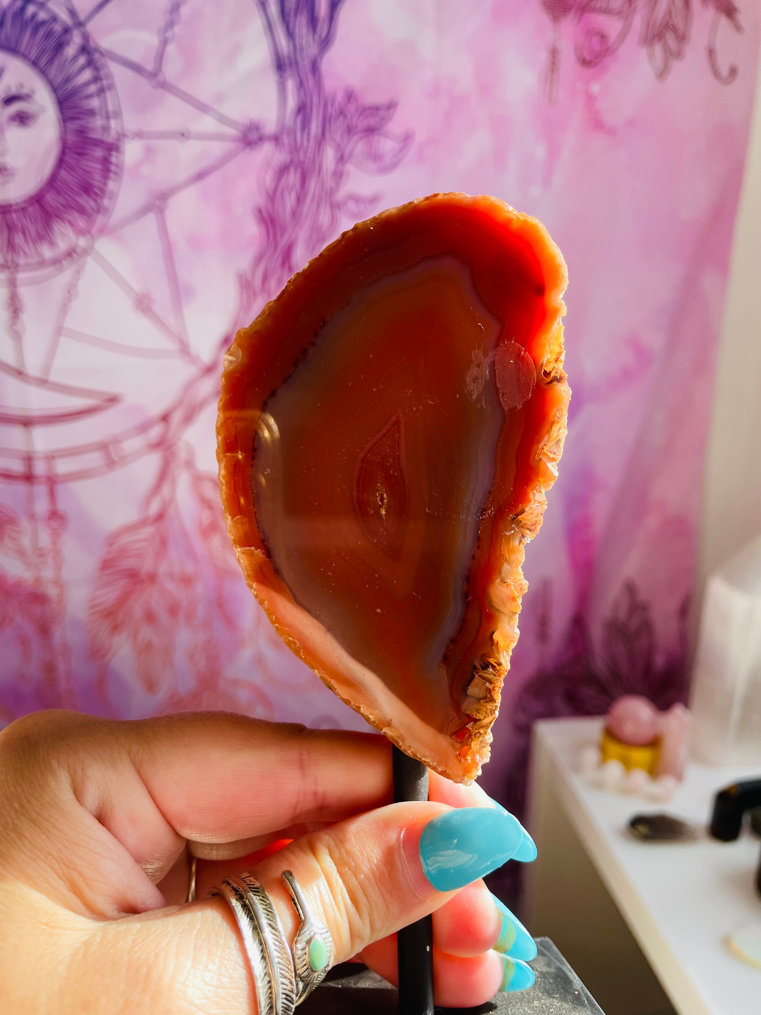 Red agate on stand
